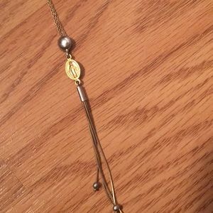 Two tone silver and gold religious necklace